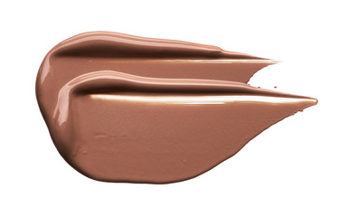 Light beige makeup smear of creamy foundation