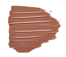 Light beige makeup smear of creamy foundation