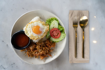 Pore fries on rice with egg thailand styes