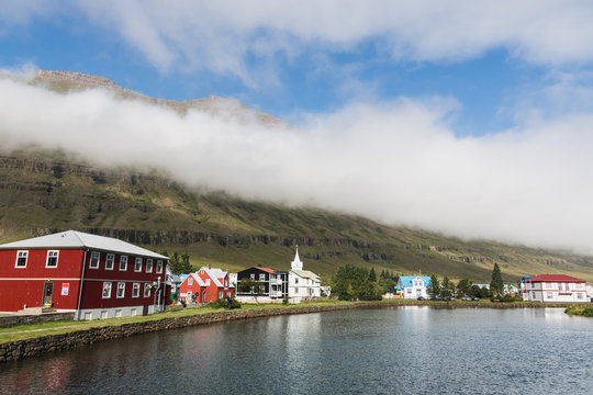 Waterfront view of the timbered houses of Seydisfjordur old town, Iceland