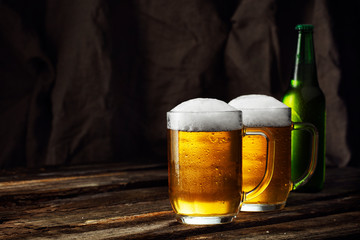 Glass of beer on a dark background