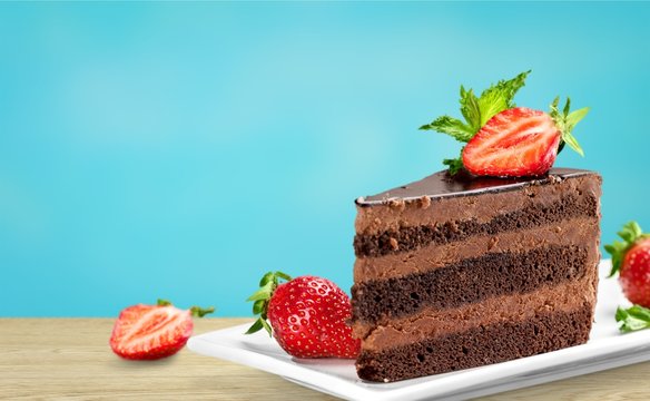 slice of delicious chocolate cake over white