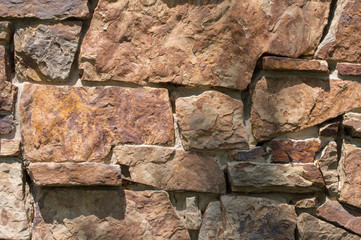 A stone wall make a neat rock background or texture.