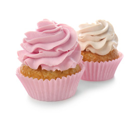 Delicious cupcakes on white background