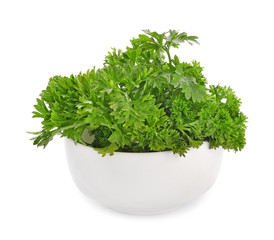Bowl with fresh aromatic parsley on white background