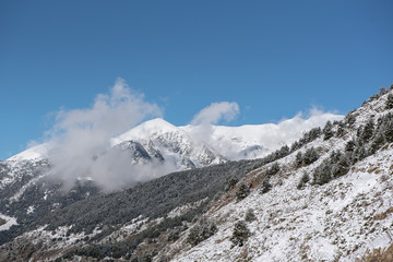 Obraz premium Landscape of Soldeu, Canillo, Andorra on an autumn morning in its first snowfall of the season.