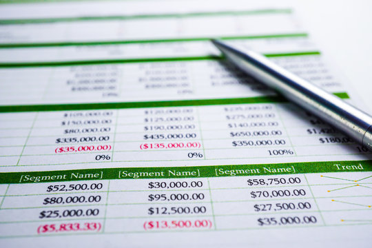 Spreadsheet table paper with pencil. Finance development, Banking Account, Statistics Investment Analytic research data economy, trading, Mobile office reporting Business company meeting concept.