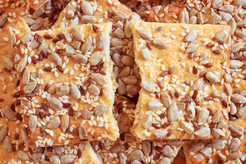 Crunchy cookies with topping of sesame, flax and sunflower seeds