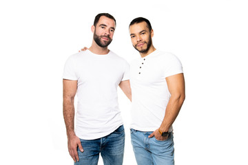 Fototapeta premium Young homosexuals gay couple love each other on a white background.