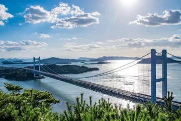 Fotobehang 瀬戸大橋と日光　Setoohashi Bridge and sunshine © Kuutanx