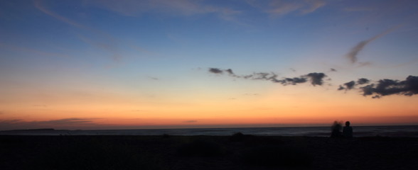 Fototapeta na wymiar Ammirare il tramonto