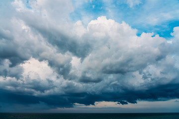Naklejka na ściany i meble Storm Clouds Gathering Over Ocean