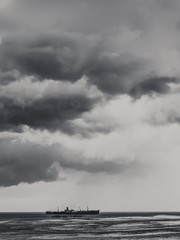 Storm Clouds Gathering Over Shipwreck Ocean
