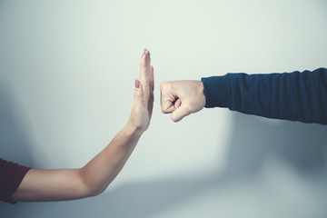 angry man with stop hand woman