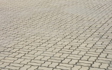 patterned paving tiles, old cement brick floor background