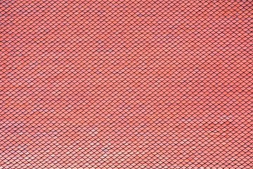 antique red tile roof pattern at the buddha temple in thailand