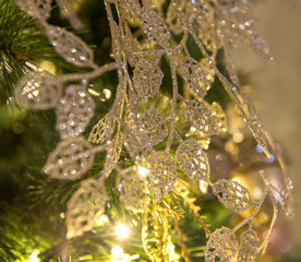 Close up of golden Christmas decoration on tree