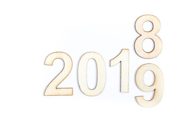 2018 to 2019 year celebrate with wooden numbers on white background