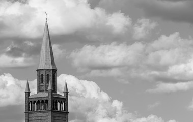 Tower of Neo-Romanesque St. Matthew Church Against A Cloudy Sky In Berlin, Germany, Black And White
