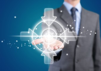 Man touching business element icons on screen