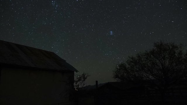 Time lapse of stars on a still night at a ranch