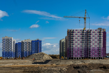 construction of apartment buildings of lilac and blue flowers