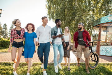 Portrait of multiethnic Hipster people having fun outdoor. Youth People, Friendship and Summer...