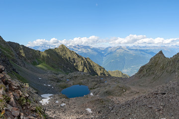 Lake of Reguzzo 2485 m. and the Donati refuge in the Orobie Valtellina Alps