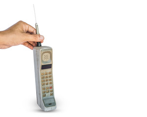 old mobile phone isolated on white