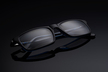 spectacles on a black background