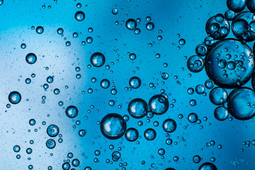 abstract blue background mixture of oil and water