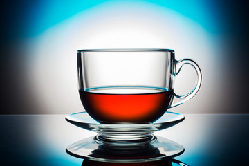 a cup of tea on a blue background