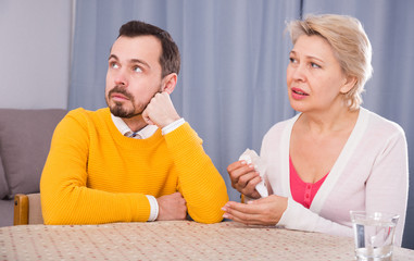 Mother and son arguing