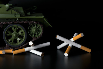 tank breaks anti-tank hedgehog made of cigarettes
