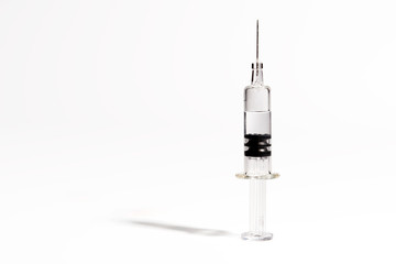 medical syringe for vaccinations on a white background