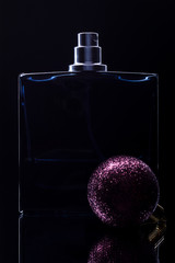 man's perfume on a black background. christmas gift concept