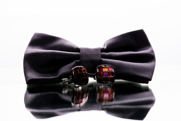 bowtie and cufflinks on white