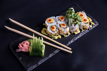 sushi roll photography , wasabi with salmon, eel, tuna, avocado, royal prawn, cream cheese Philadelphia, caviar tobica, chuka. Sushi menu. Japanese food.