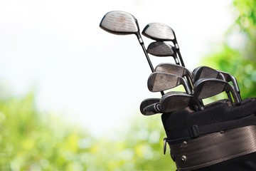Golf clubs drivers over  background.