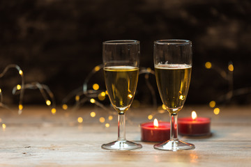 two glasses of champagne and christmas decoration