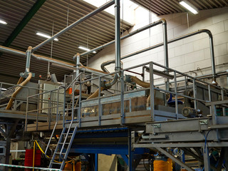 Sorting and packaging line in an agriculture production packing house