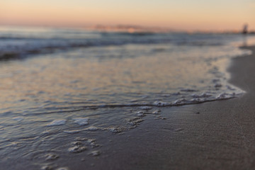 Coastline of the beach on the unfocused background