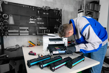 master professional refills laser printer cartridges in the workshop