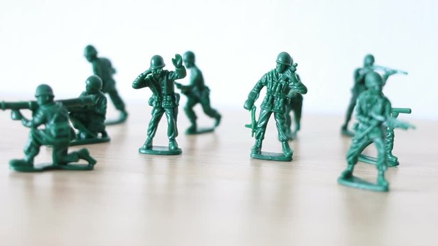 Close up of toy military at war.