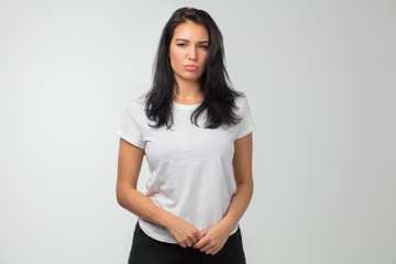 gorgeous woman is being offended at something. close up photo. female takes offence at the least thing