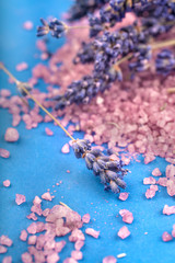 A lavender salt with a decoration of flowers on a blue background
