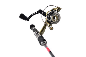fishing reel on a fishing rod, white background close-up
