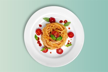 Delicious pasta on white plate on  background