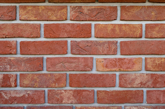 Fototapeta texture of clinker bricks, background for your text, brick wall close up