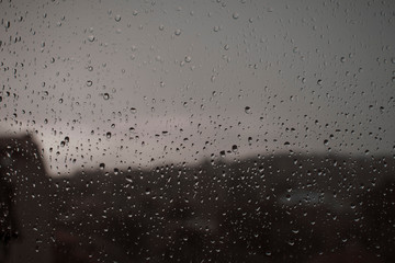 Raindrops. On the car window